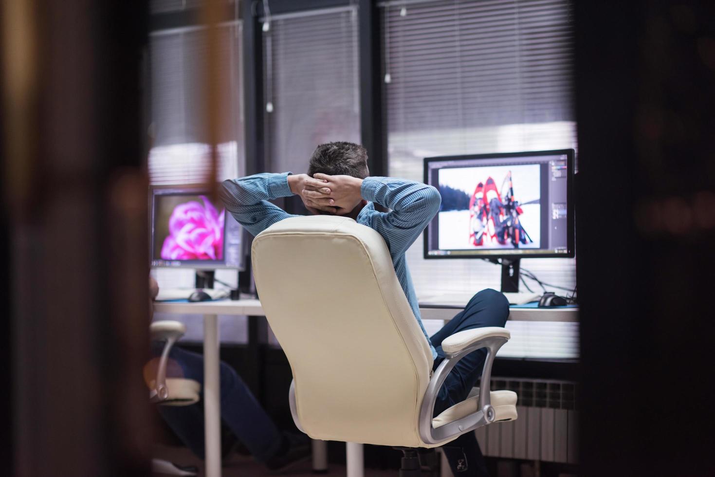 photo editor at his desk