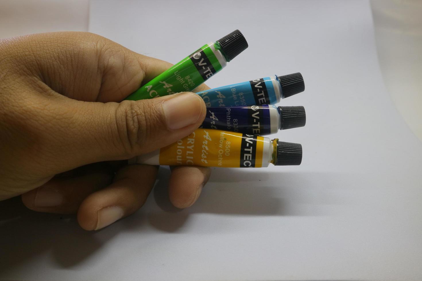 Semarang Indonesia, November 22, 2021 Colorful acrylic paint on white background photo