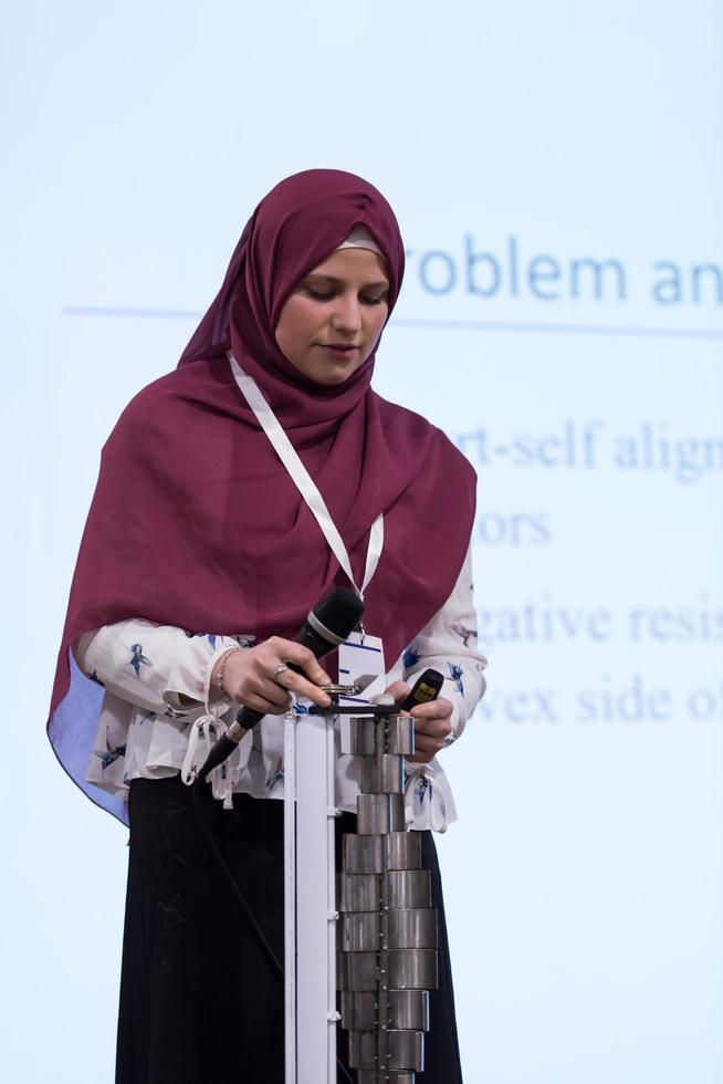 Muslim businesswoman giving presentations photo