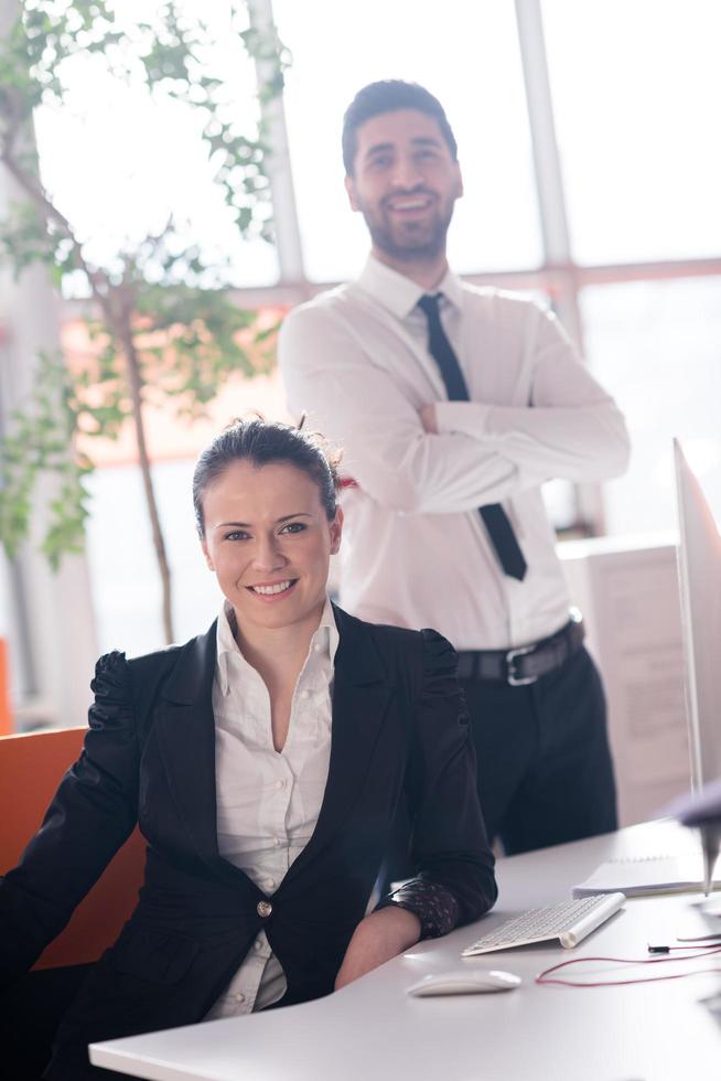 portrait of business couple at office photo