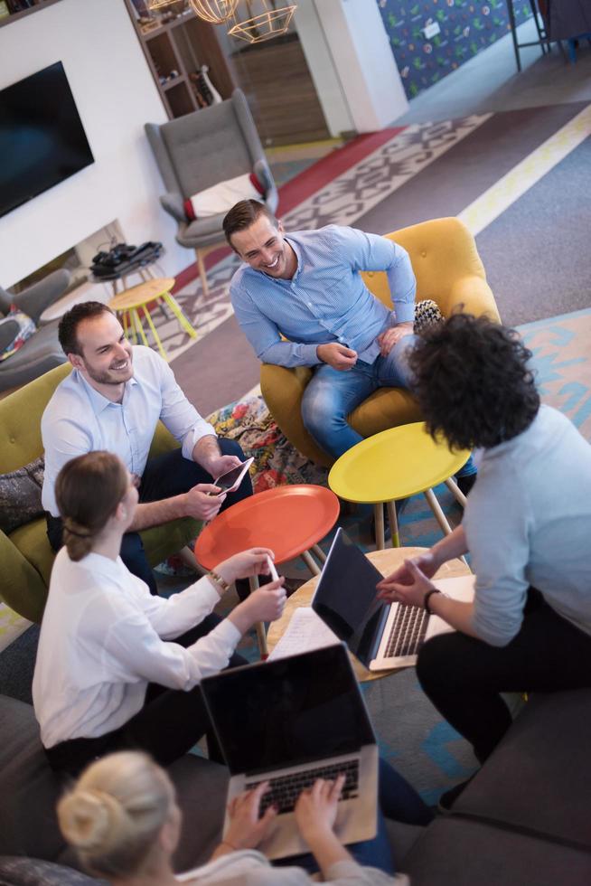 Startup Business Team At A Meeting at modern office building photo
