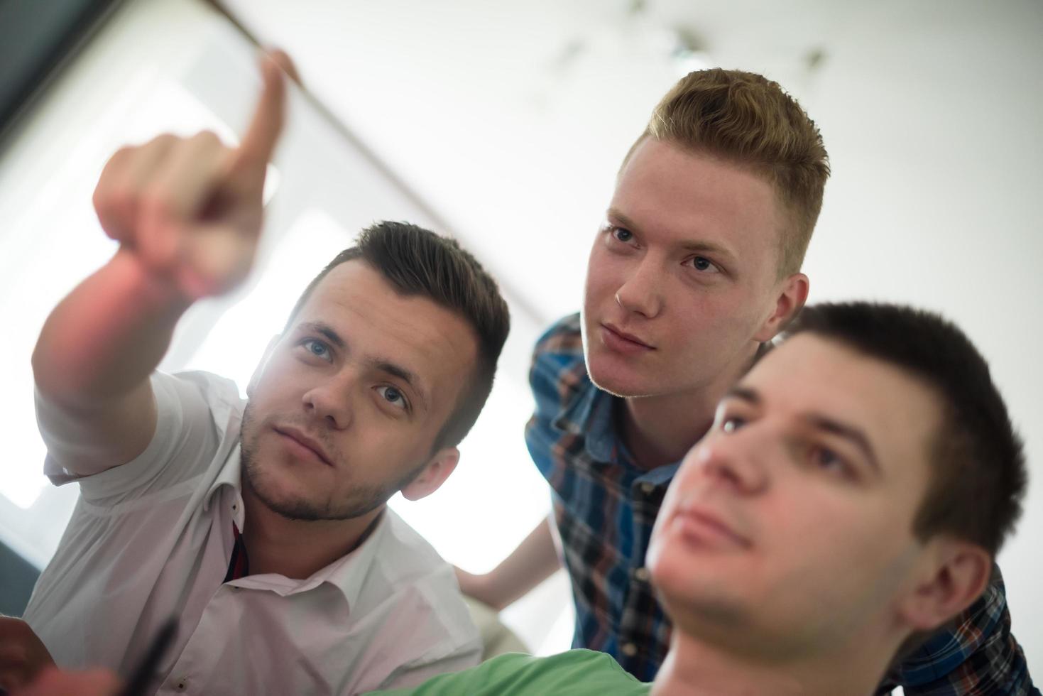 a group of graphic designers at work photo