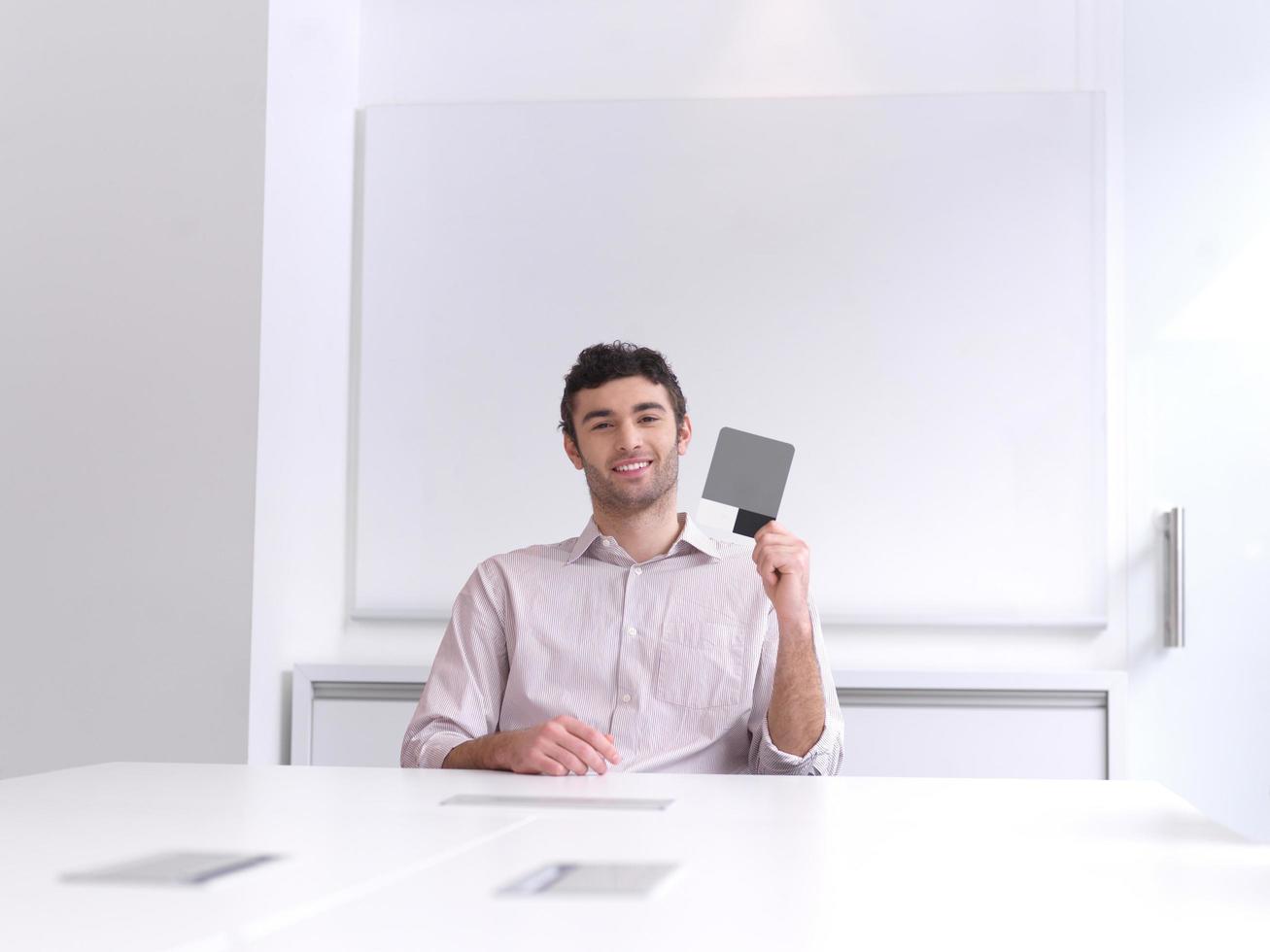 young business man portrait  at modern office photo
