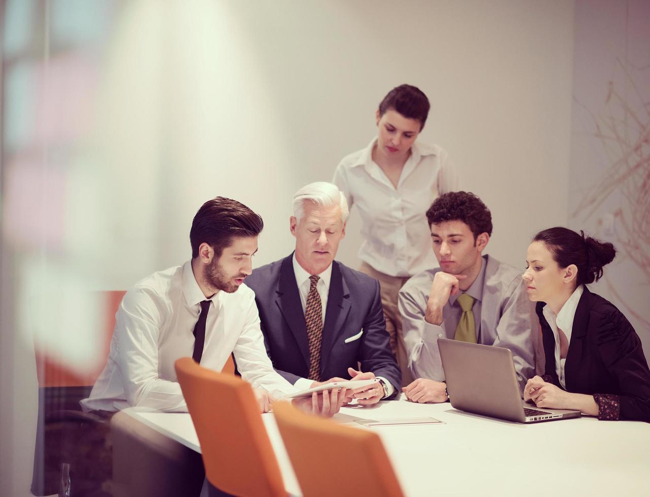 business people group on meeting at modern startup office photo