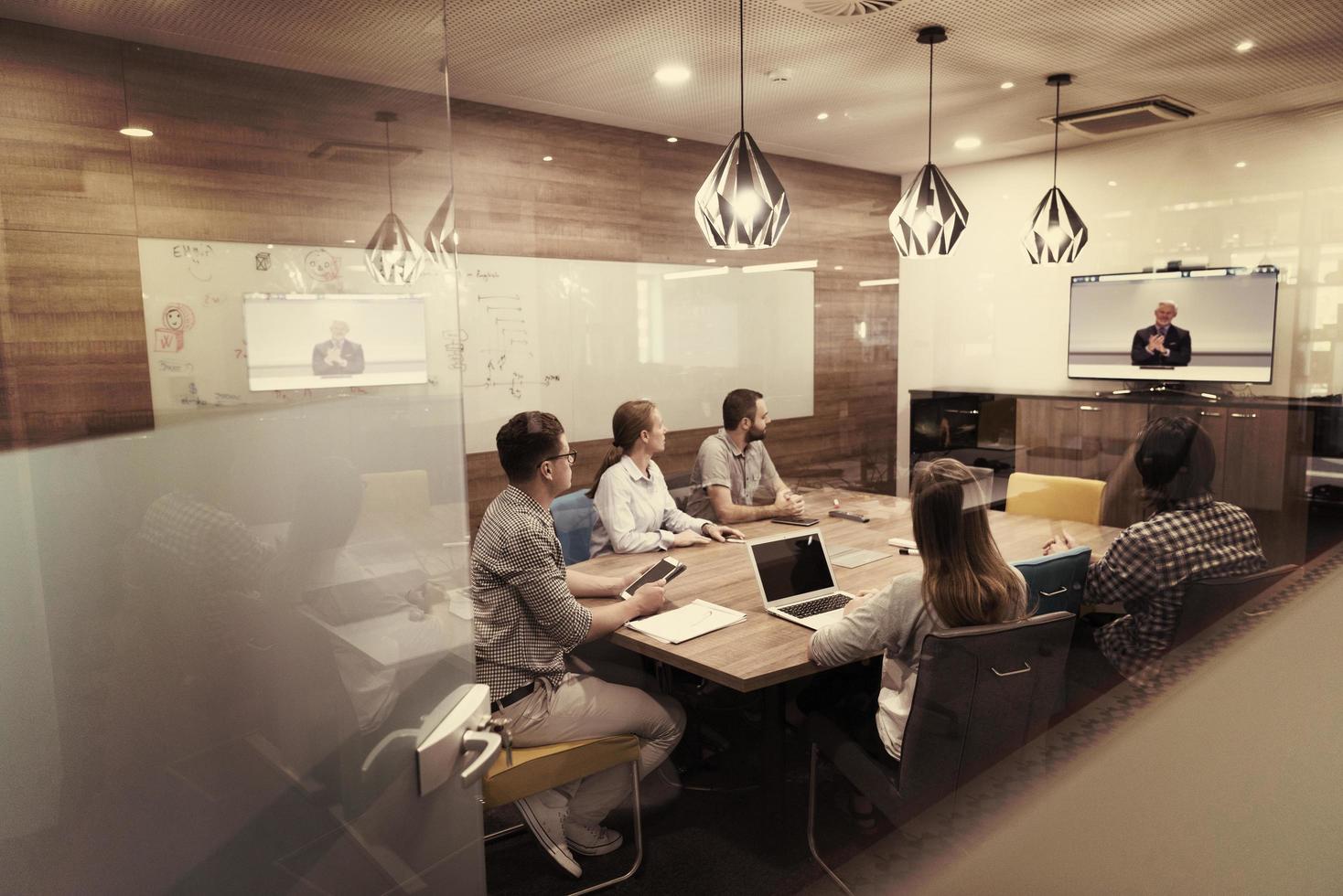 start up business people group attending videoconference call photo