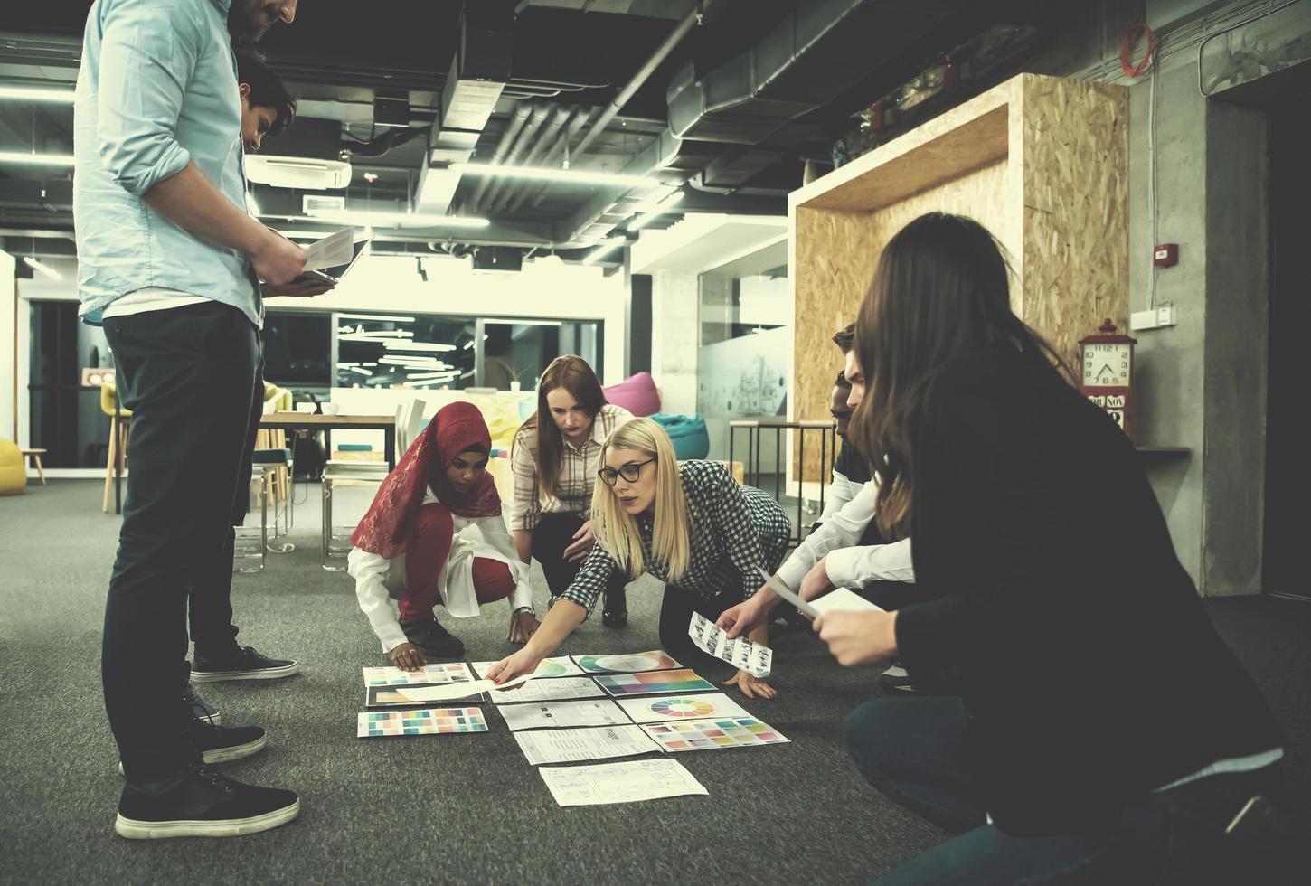 black muslim woman having meeting with Multiethnic  startup business team photo