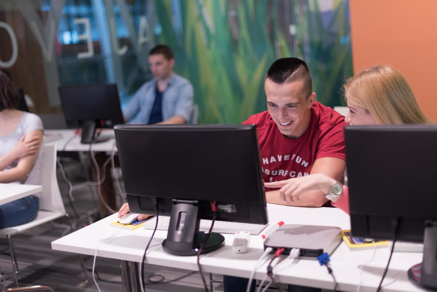 technology students group working in computer lab school  classroom photo