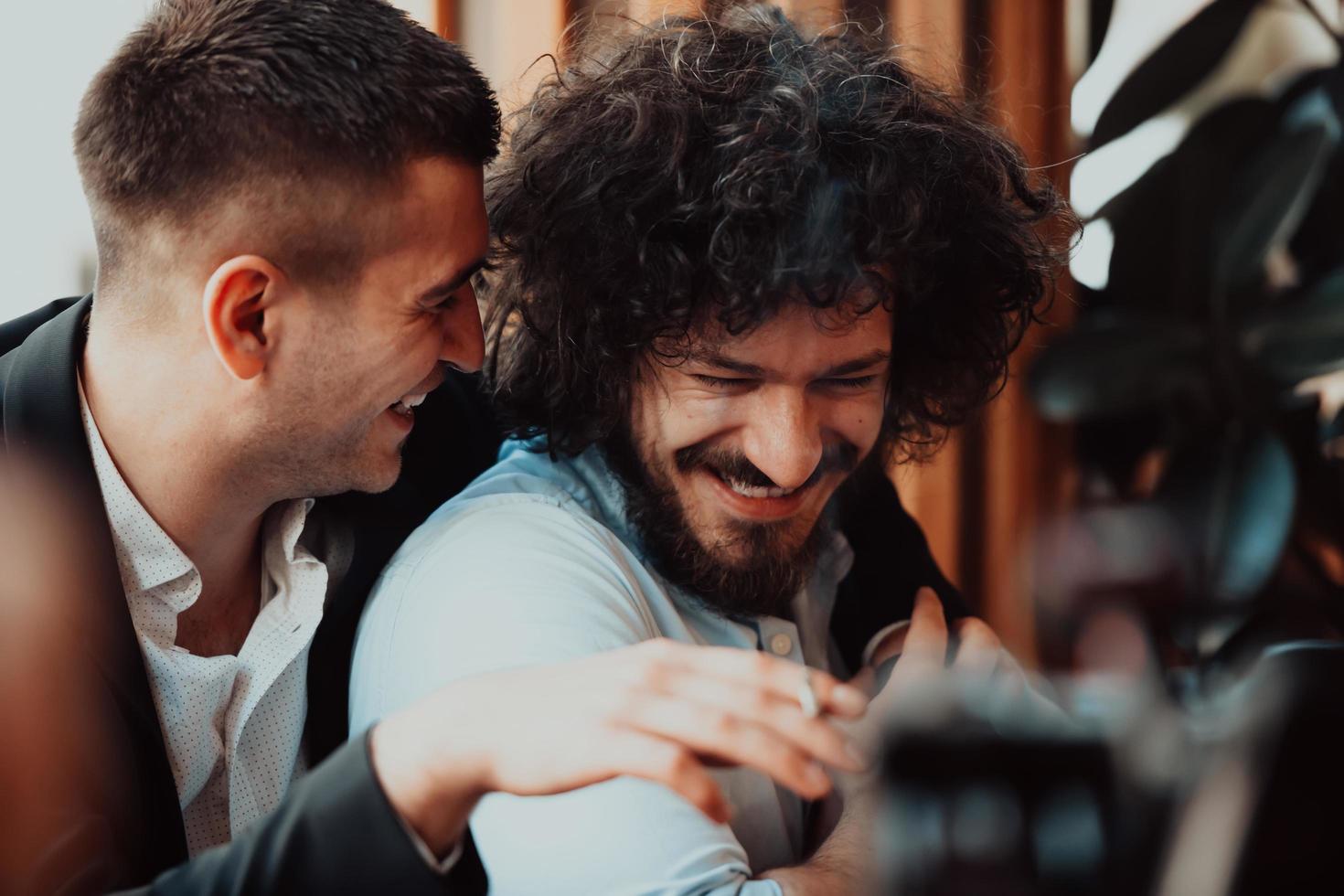 Diverse friends gay couple hugging. Stylish cool generation z men dating in love enjoy romantic relationships photo