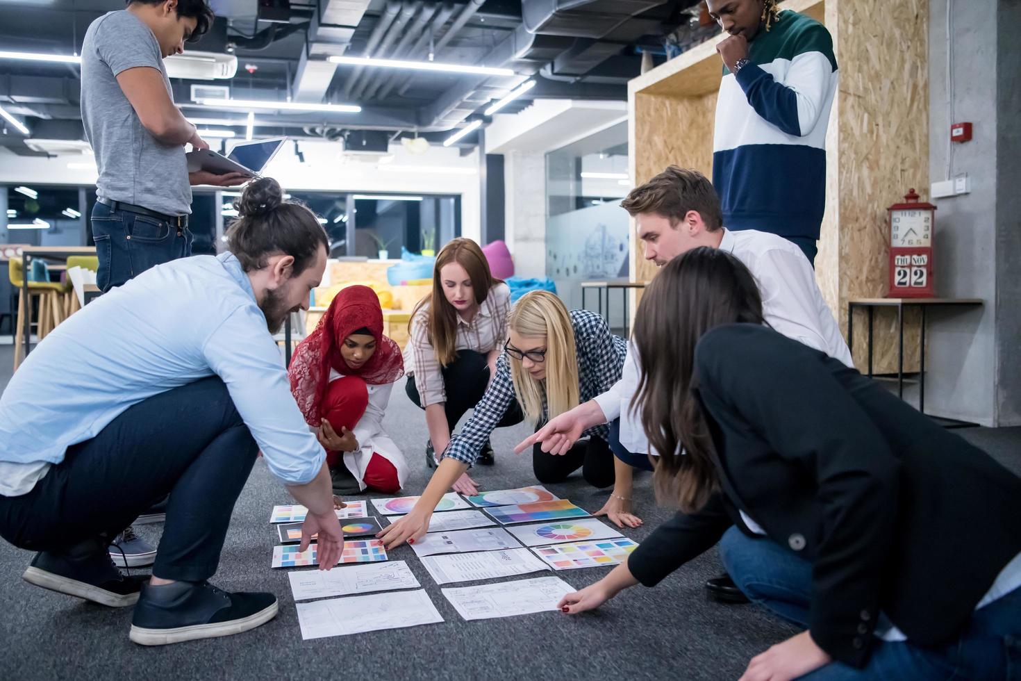 black muslim woman having meeting with Multiethnic  startup business team photo