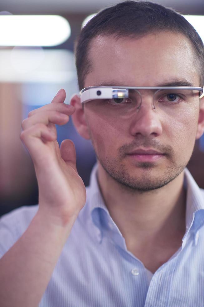 man using virtual reality gadget computer glasses photo