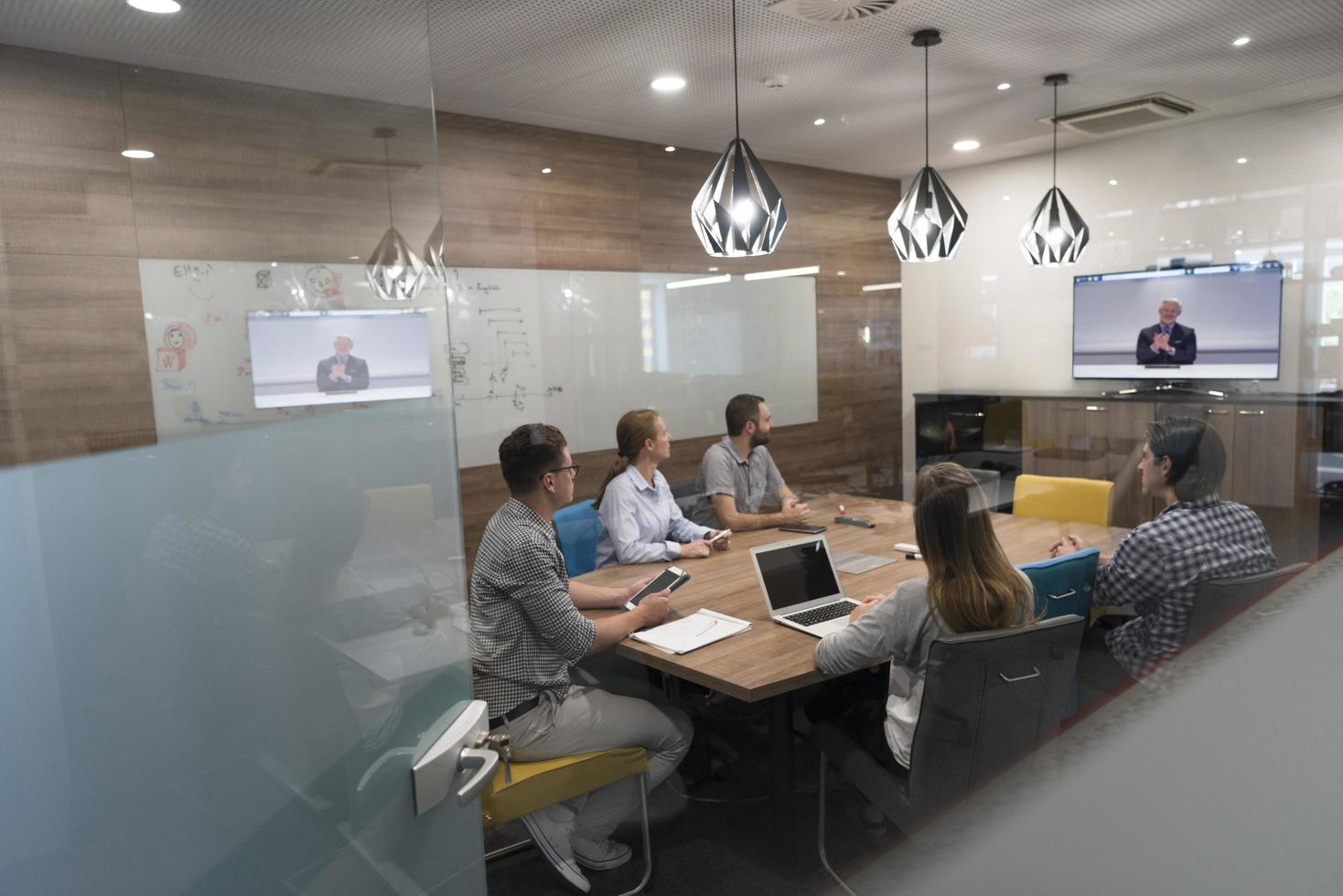 start up business people group attending videoconference call photo
