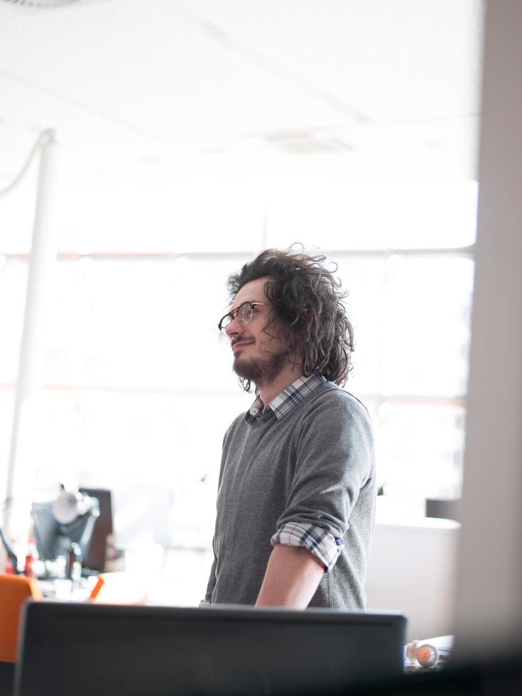 young businessman in startup office photo