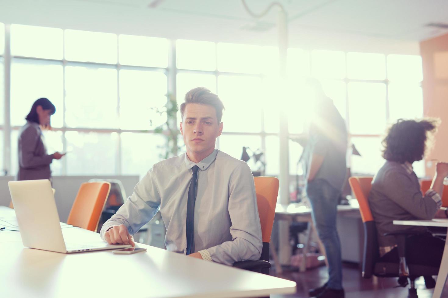 businessman working using a laptop in startup office photo
