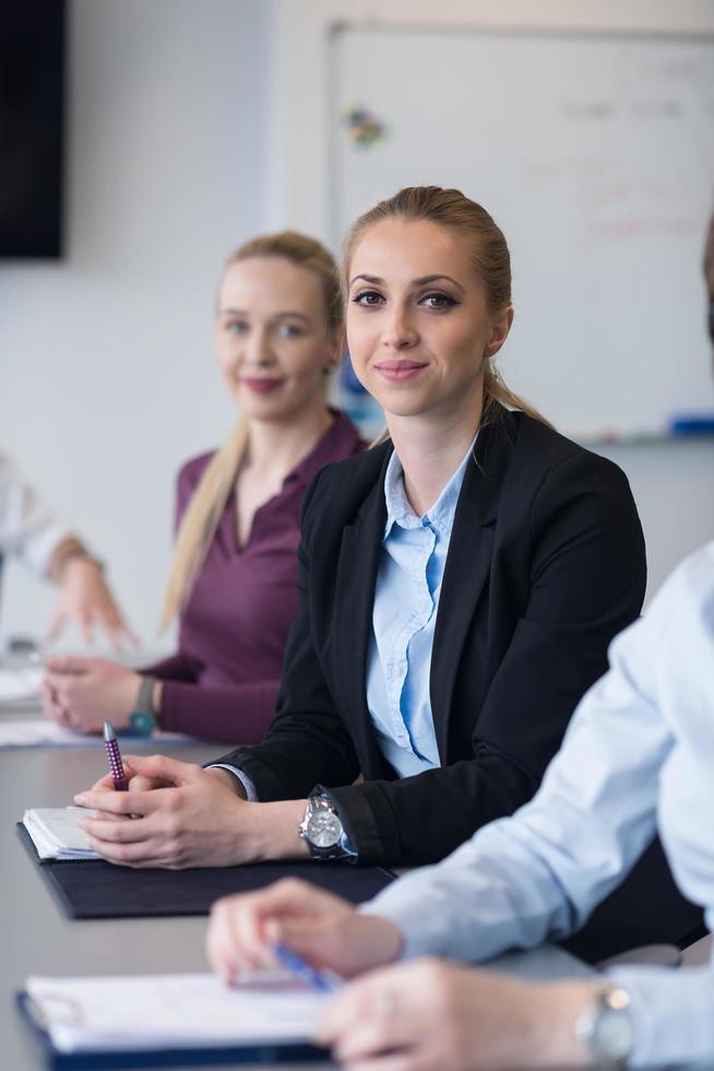 young business people group on team meeting at modern office photo