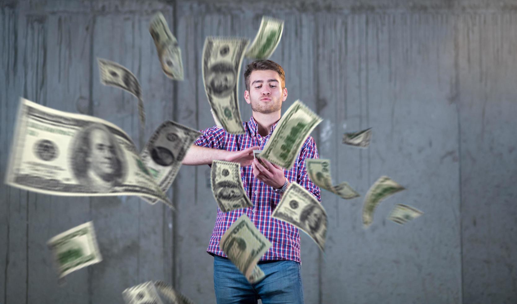 businessman making the rain of money photo