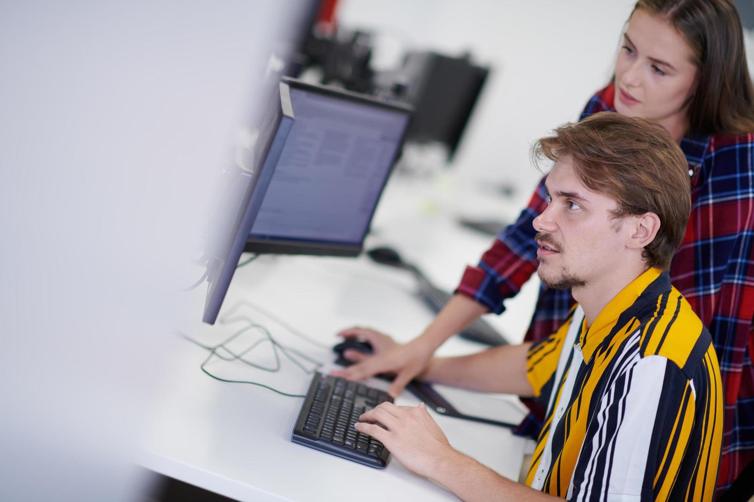business couple working together on project photo