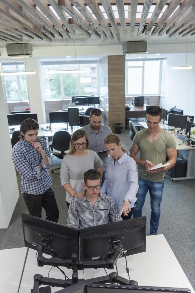 startup business people group working as team to find solution photo