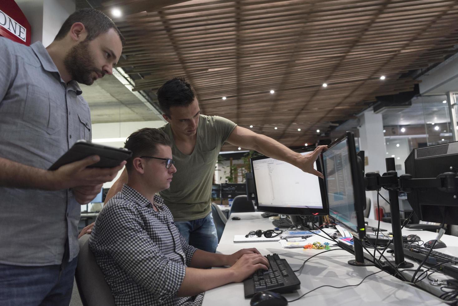 startup business people group working as team to find solution photo