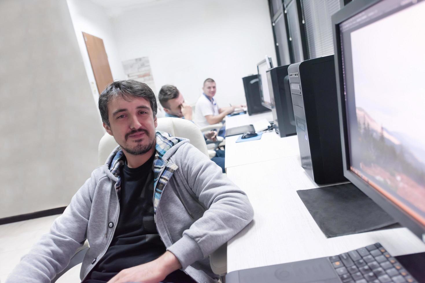 photo editor at his desk