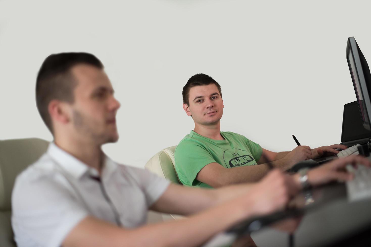 a group of graphic designers at work photo