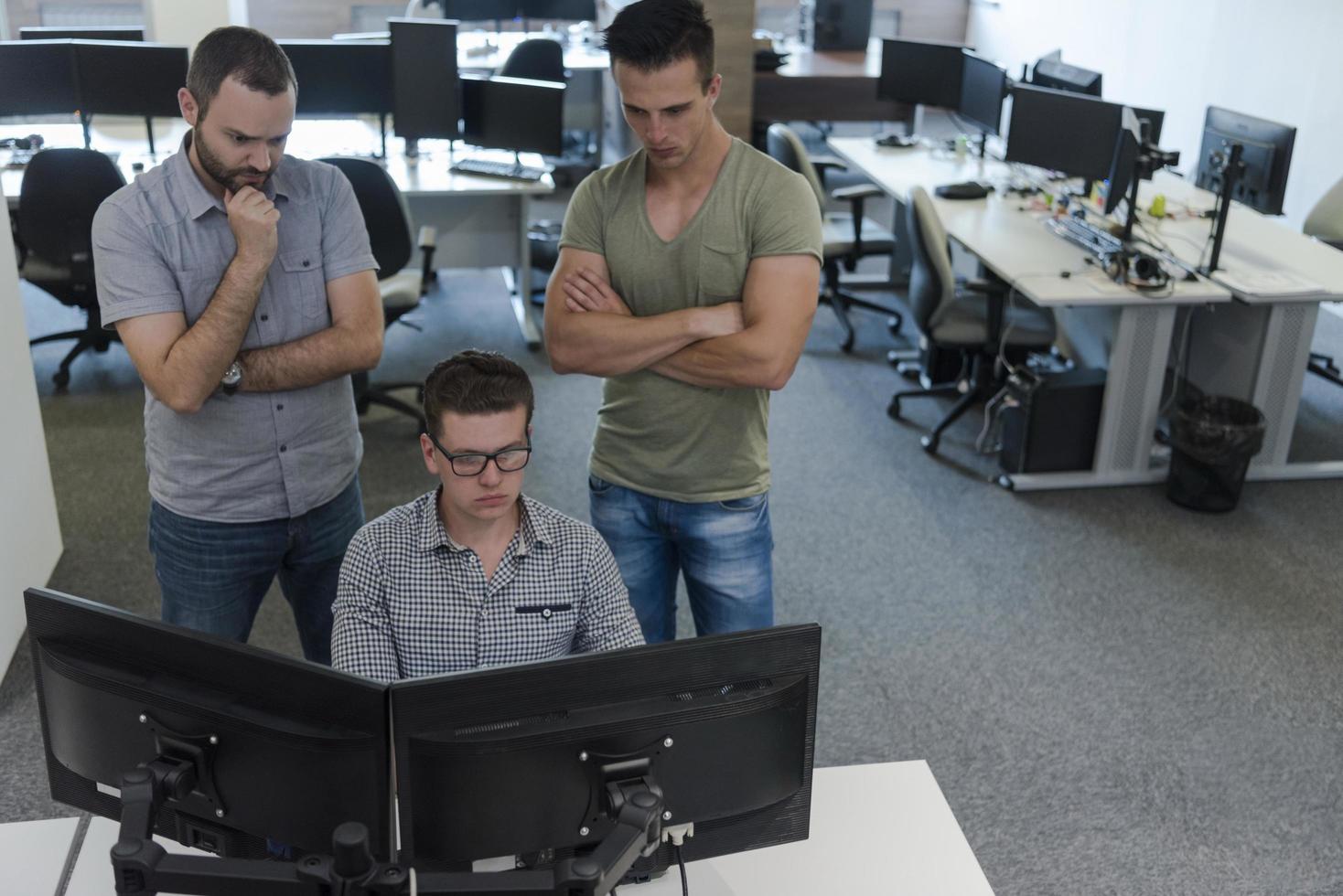 startup business people group working as team to find solution photo