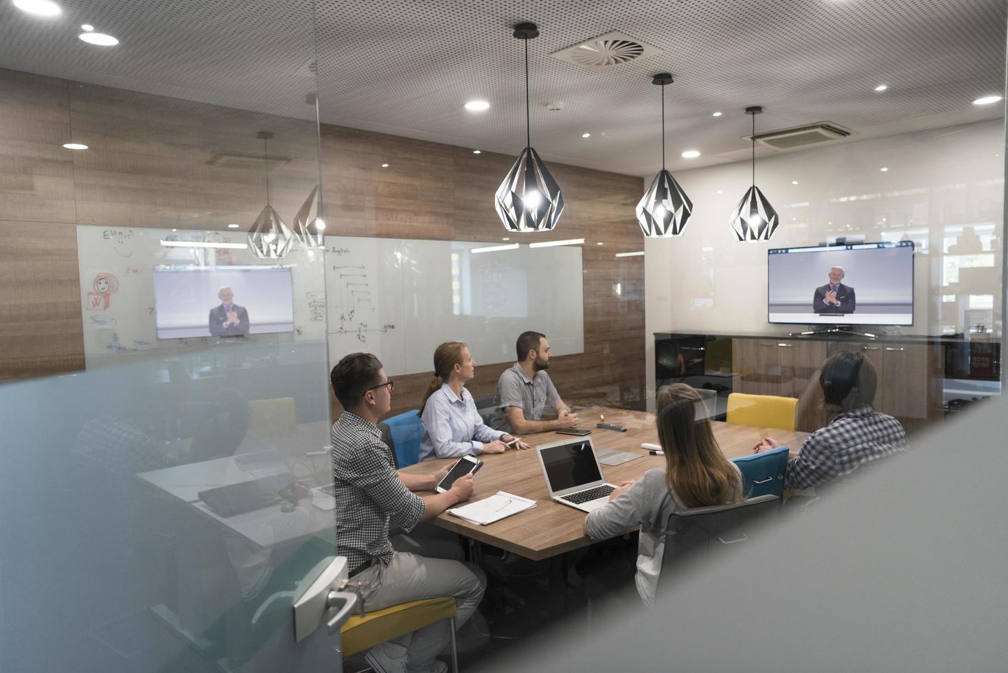 start up business people group attending videoconference call photo