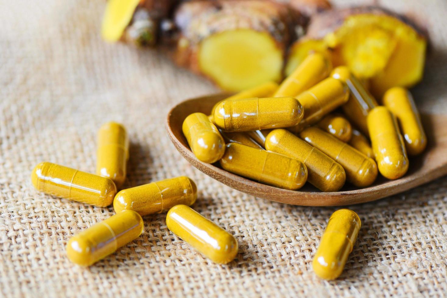 Herbal capsules herb turmeric healthy lifestyle - Herbal medicine extract from nature Non-toxic drug organic product photo