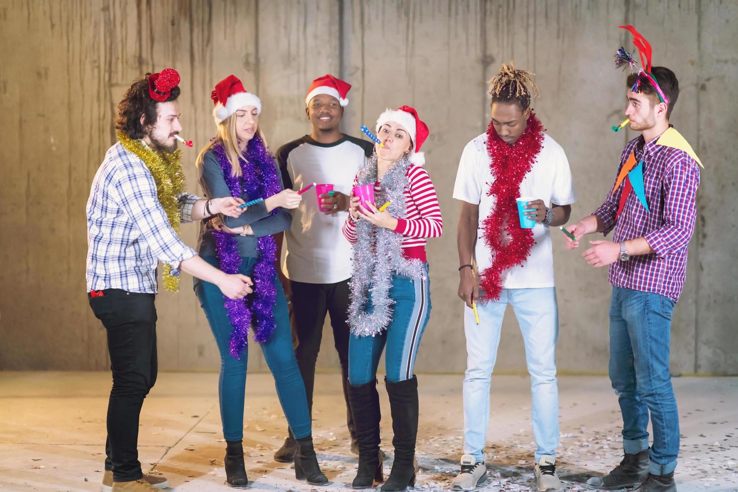 multiethnic group of casual business people lighting a sparkler photo