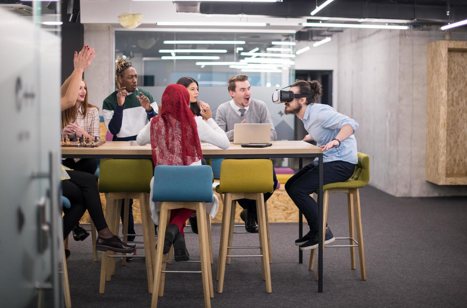 Young Multiethnic Business team using virtual reality headset photo
