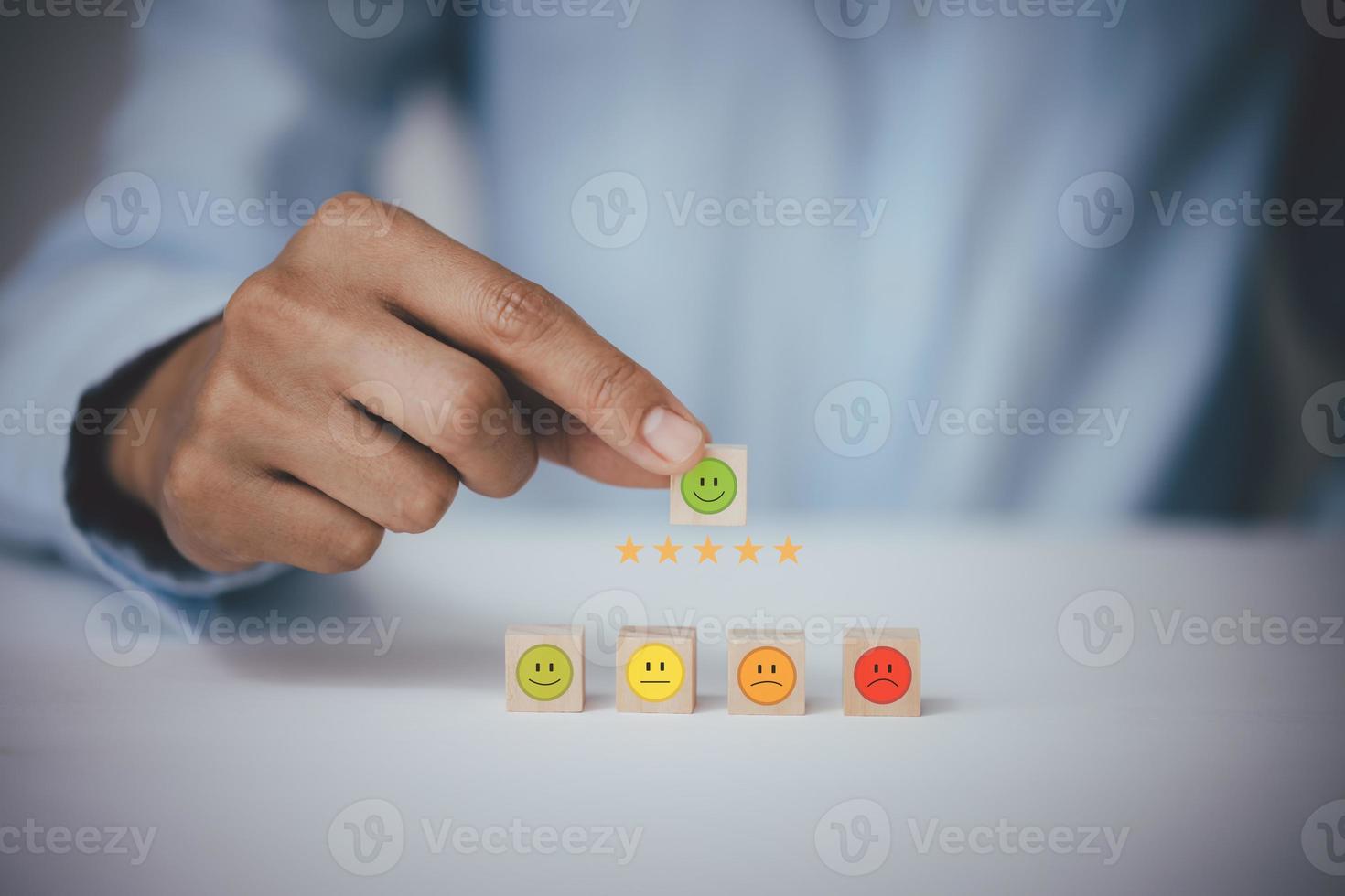 Customer service evaluation concept.  Businessman pressing happy icon, Customer service evaluation concept. photo