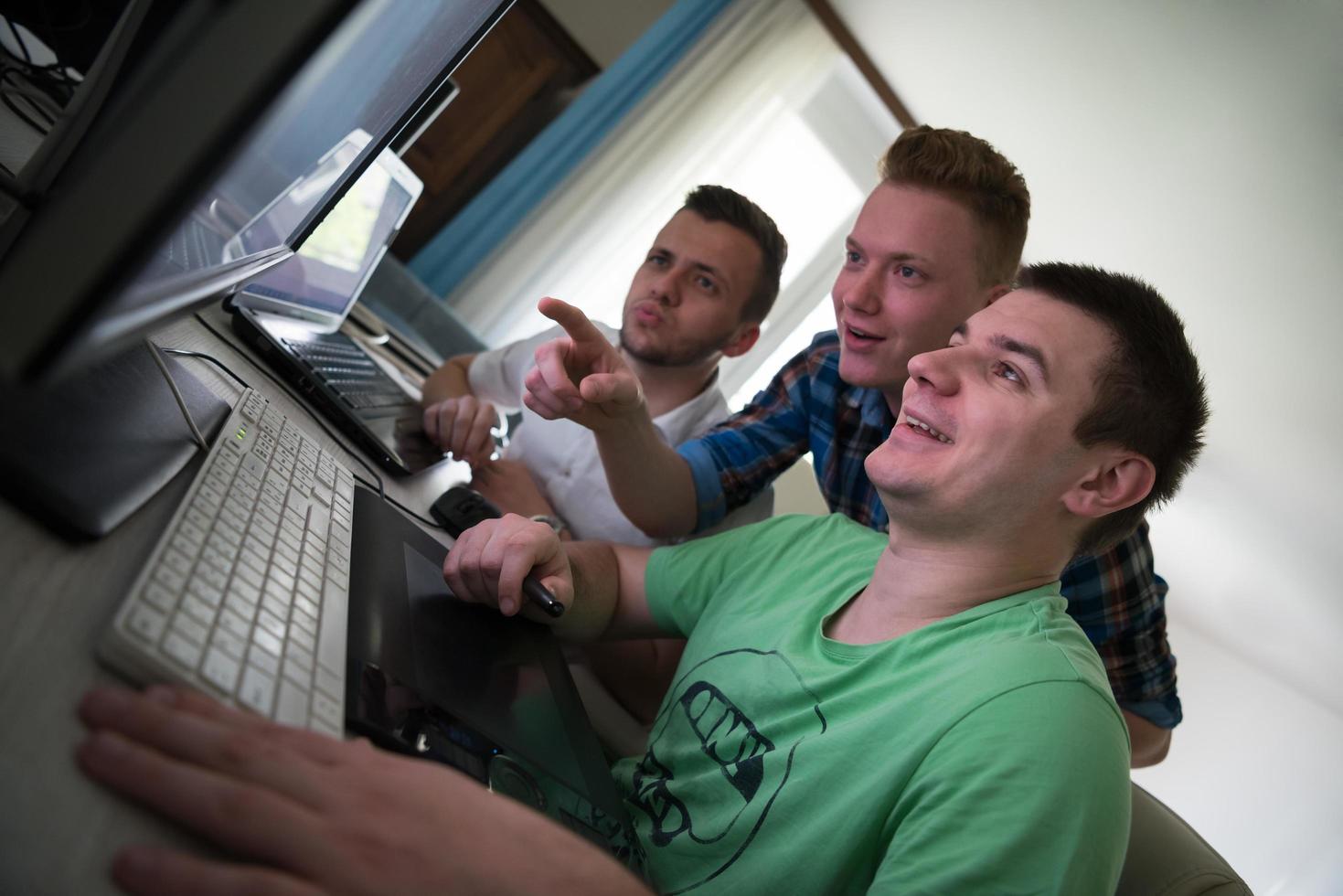 a group of graphic designers at work photo