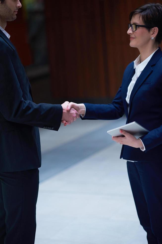 business man and woman hand shake photo