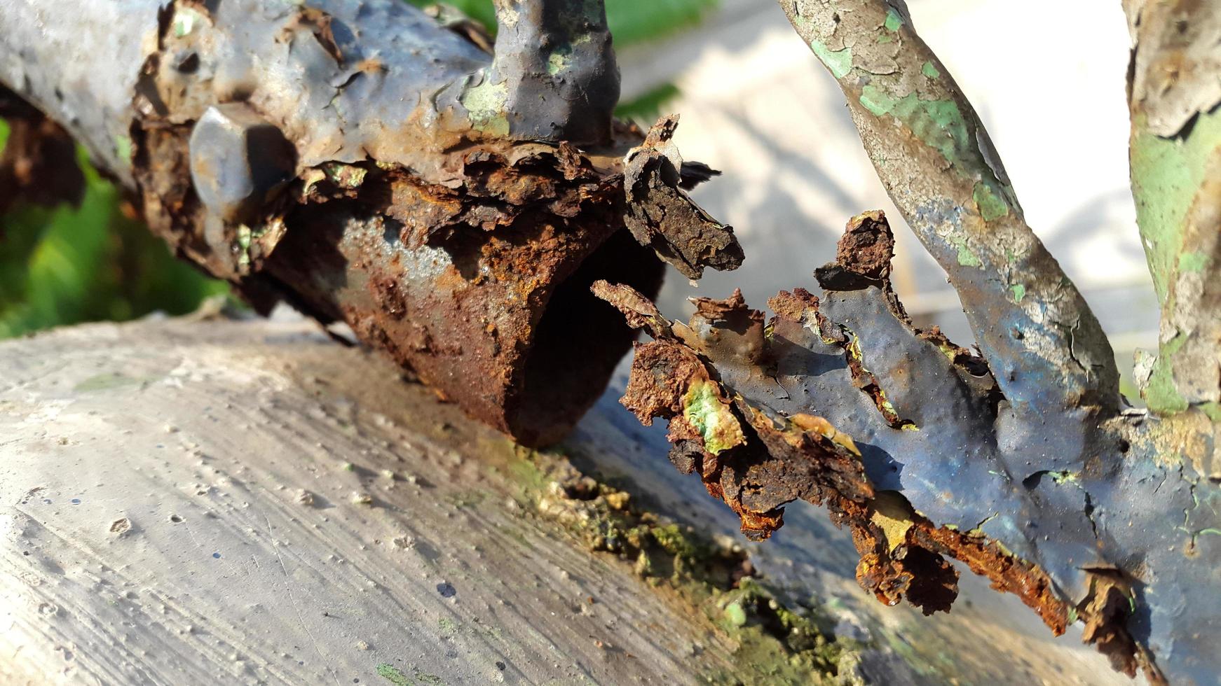rusty and brittle blue steel ladder photo