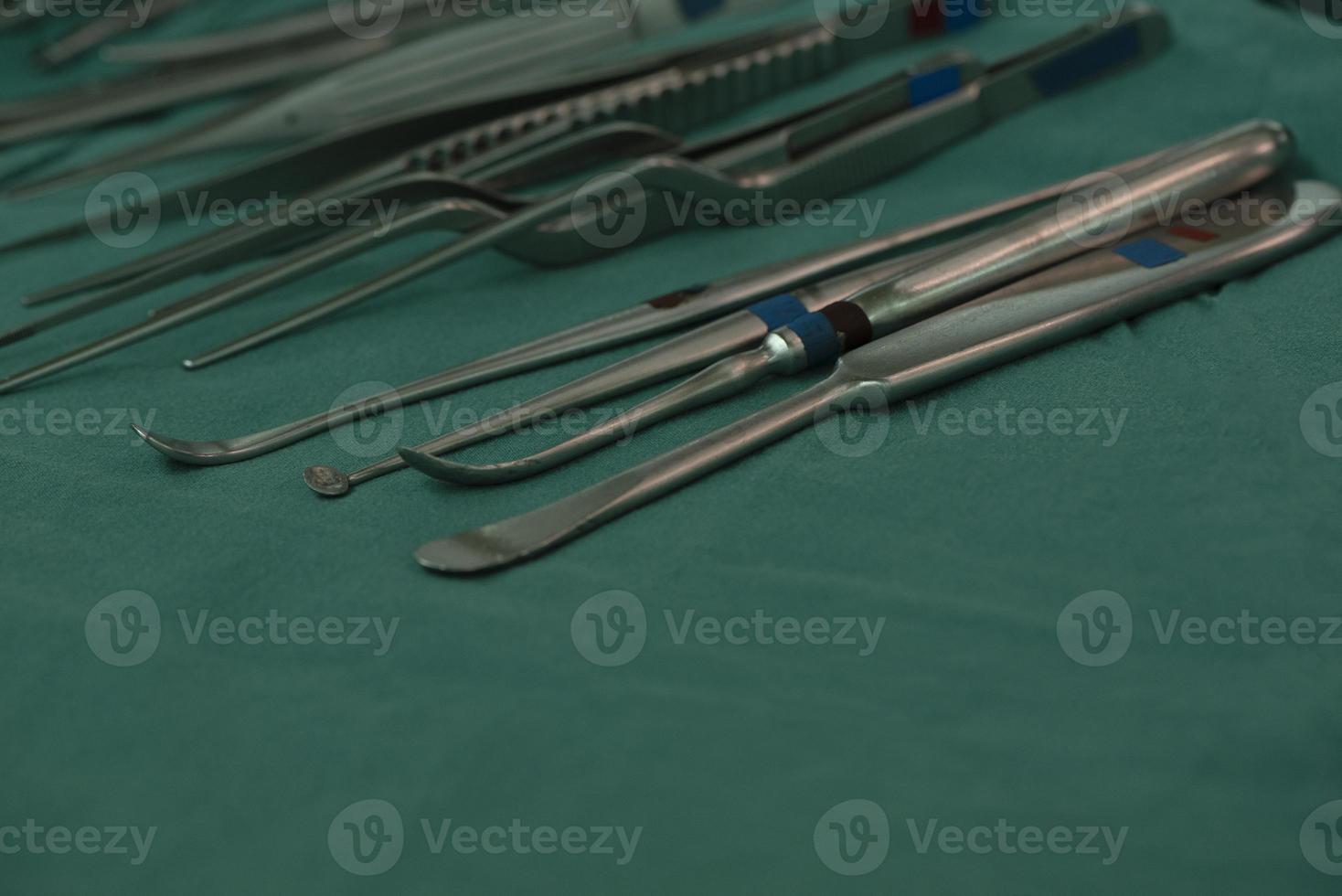 Set of surgical instruments on the table photo