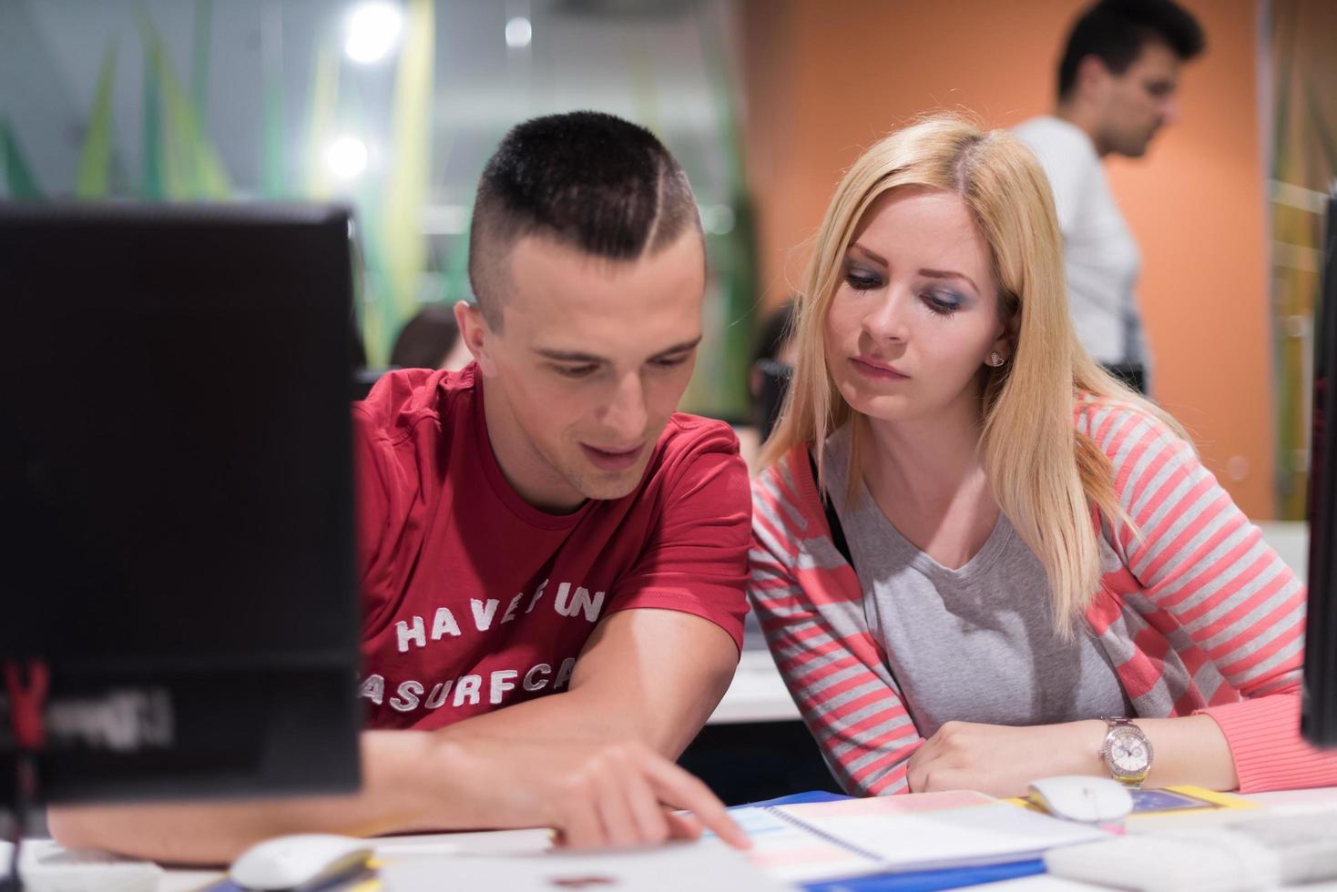 technology students group working  in computer lab school  classroom photo