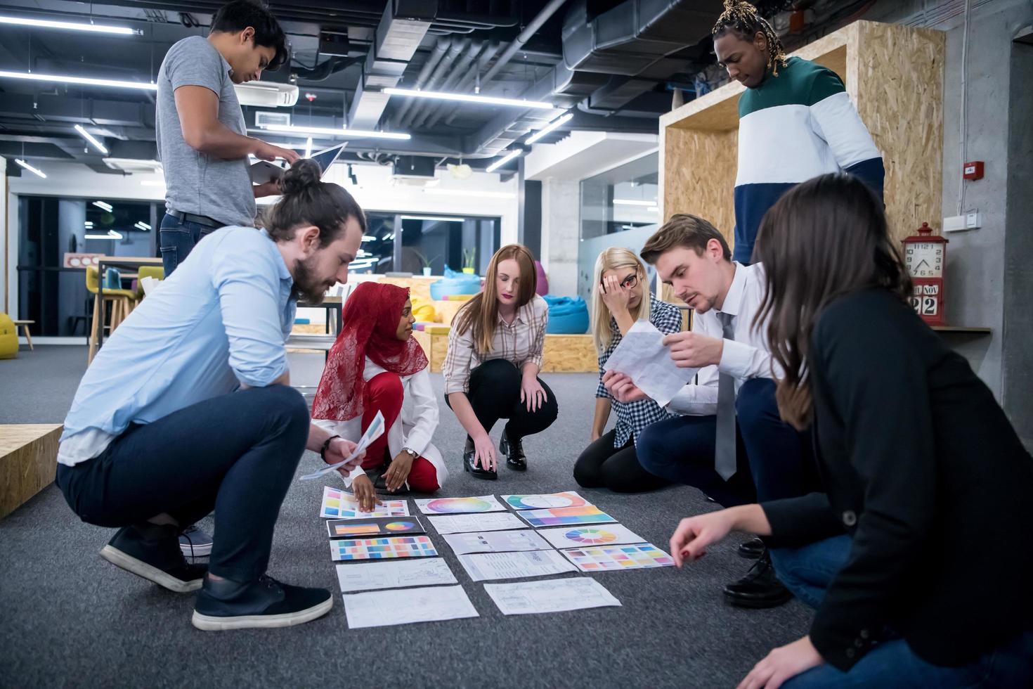 black muslim woman having meeting with Multiethnic  startup business team photo