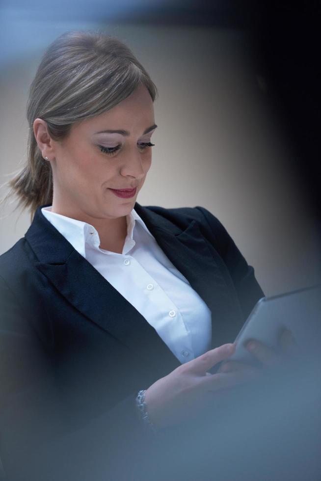 business woman working on tablet photo