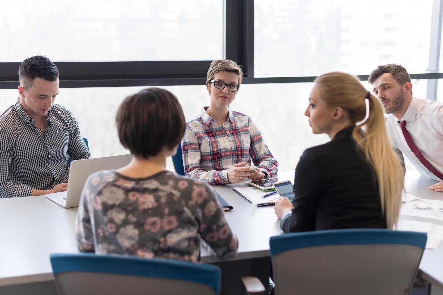 young business people group on meeting at modern office photo