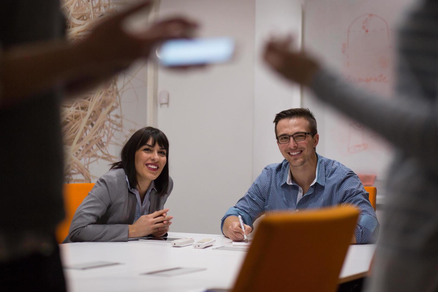 Business Team At A Meeting at modern office building photo