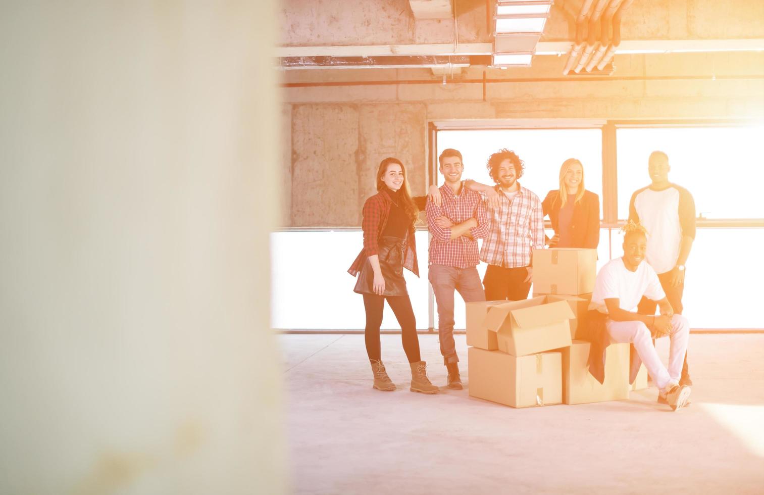 portrait of multiethnic business people with sunlight through the windows photo