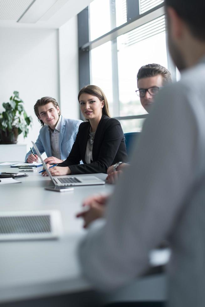 Business Team At A Meeting at modern office building photo