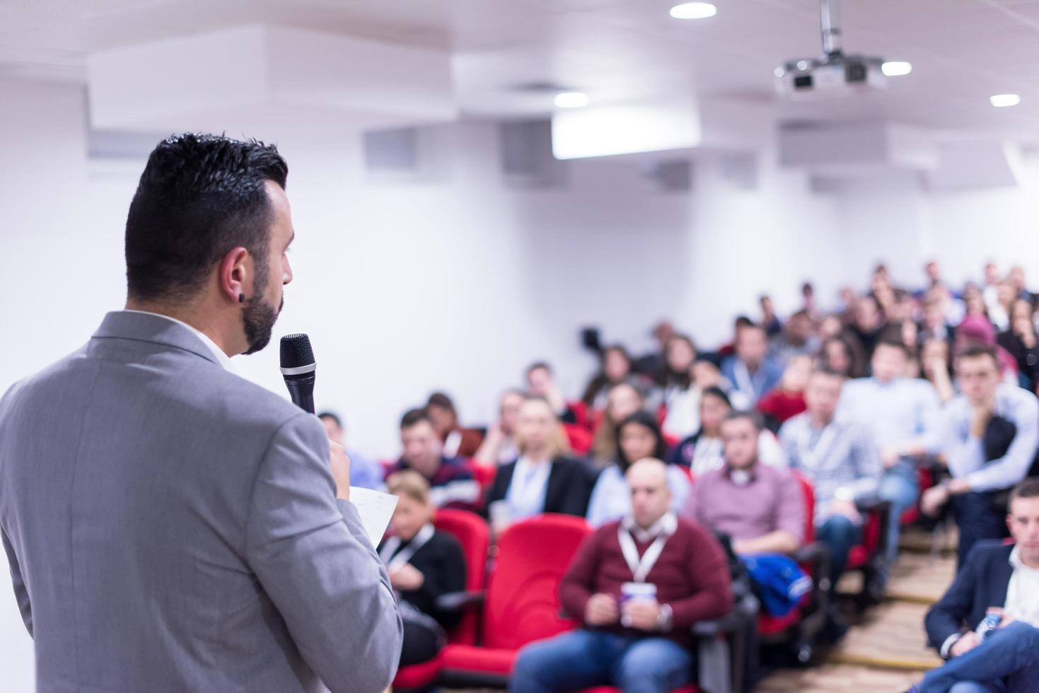 successful businessman giving presentations at conference room photo