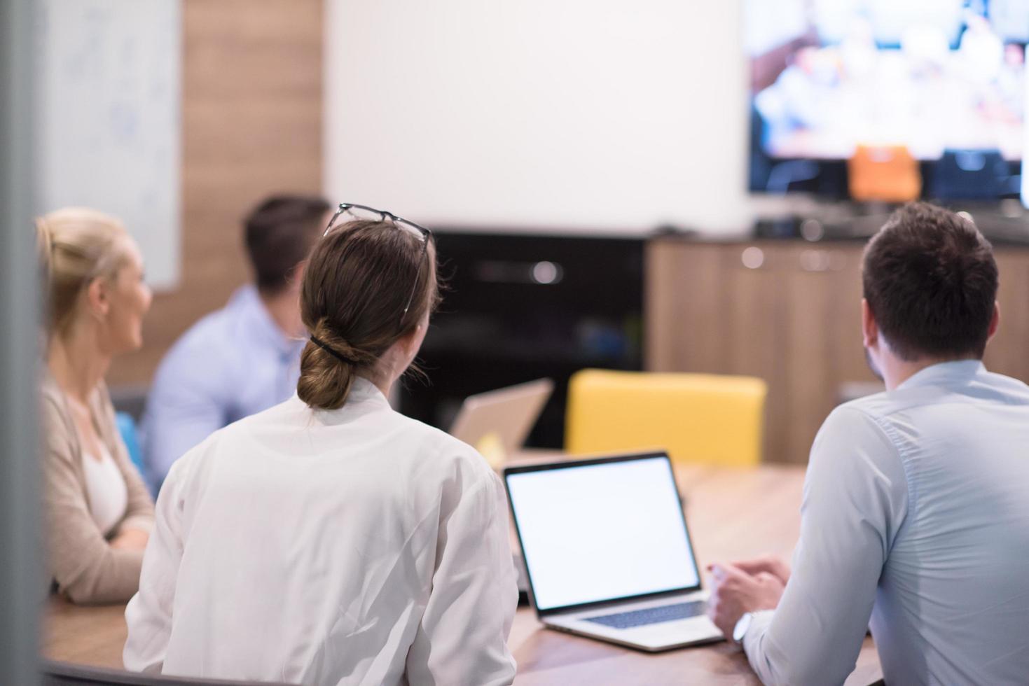 Startup Business Team At A Meeting at modern office building photo