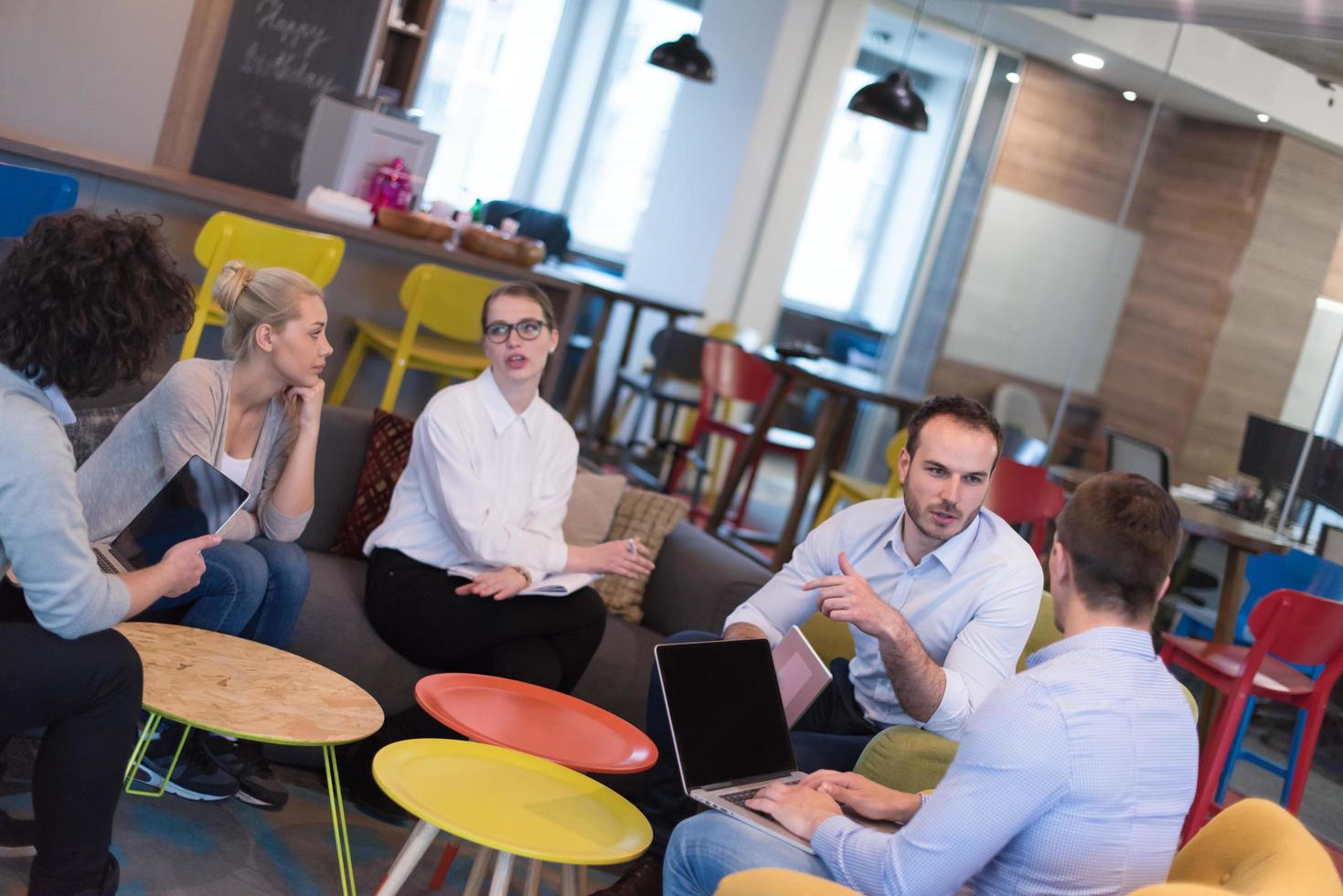 Startup Business Team At A Meeting at modern office building photo