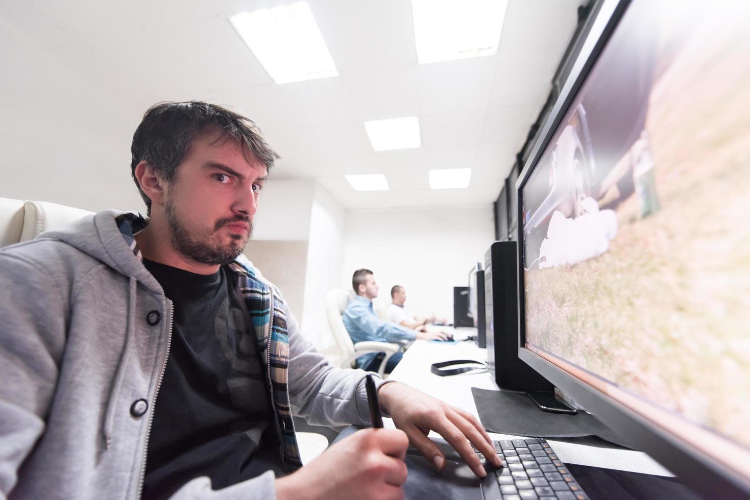 photo editor at his desk