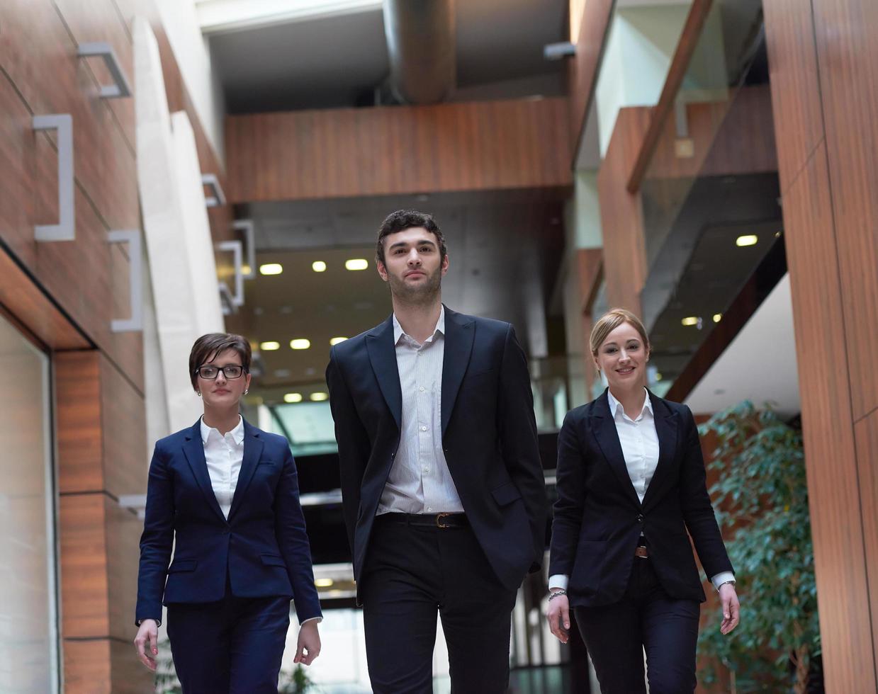 business people team walking photo