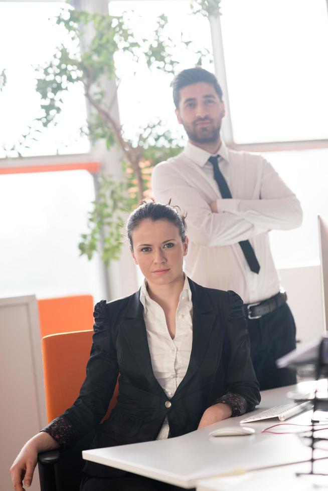 portrait of business couple at office photo