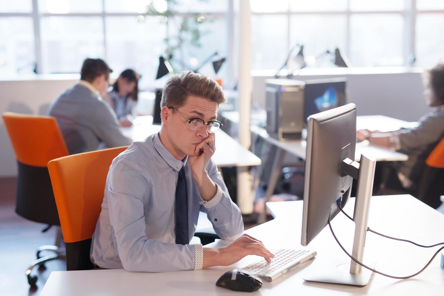 businessman working using a computer in startup office photo