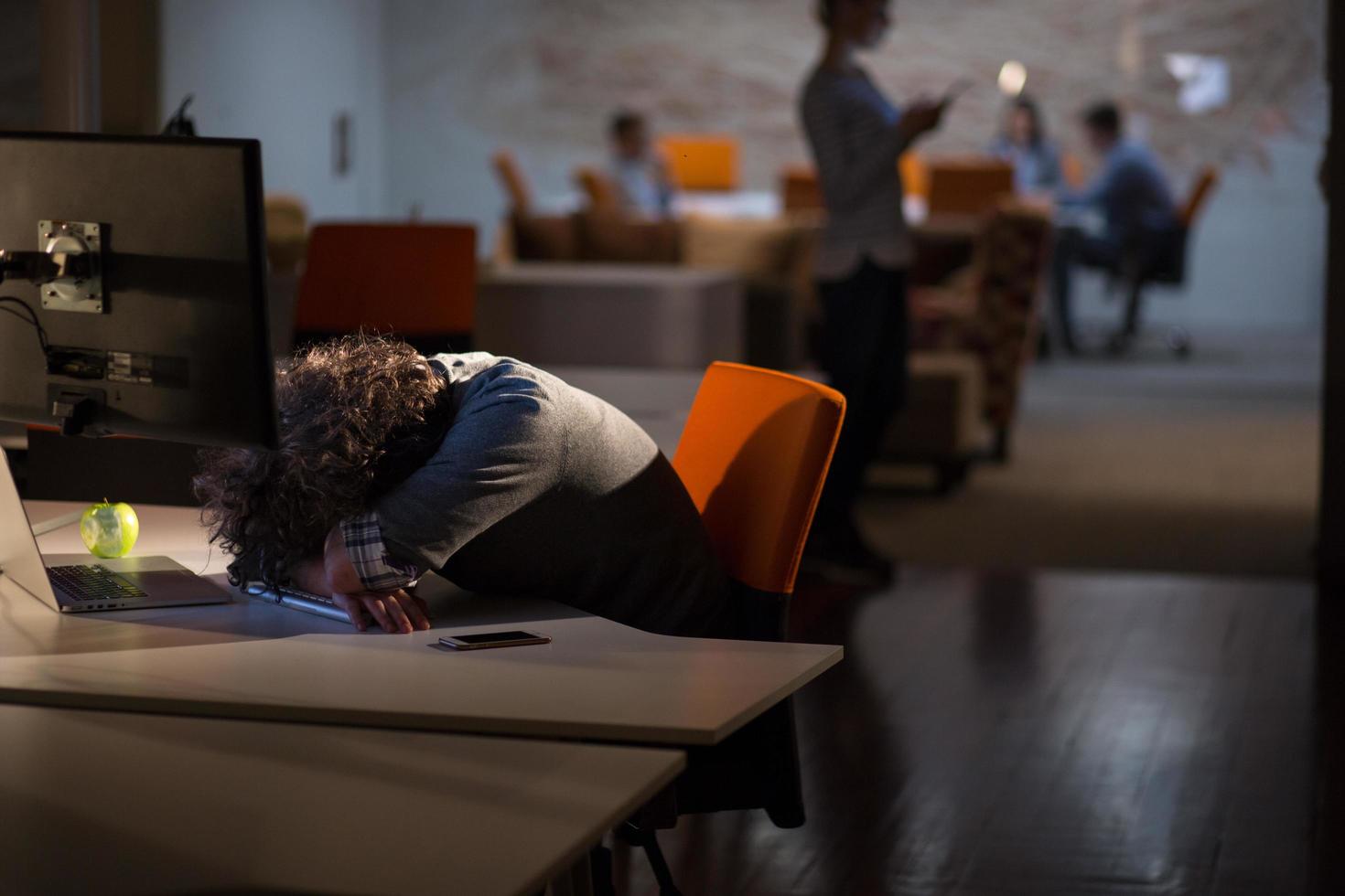 businessman relaxing at the desk photo