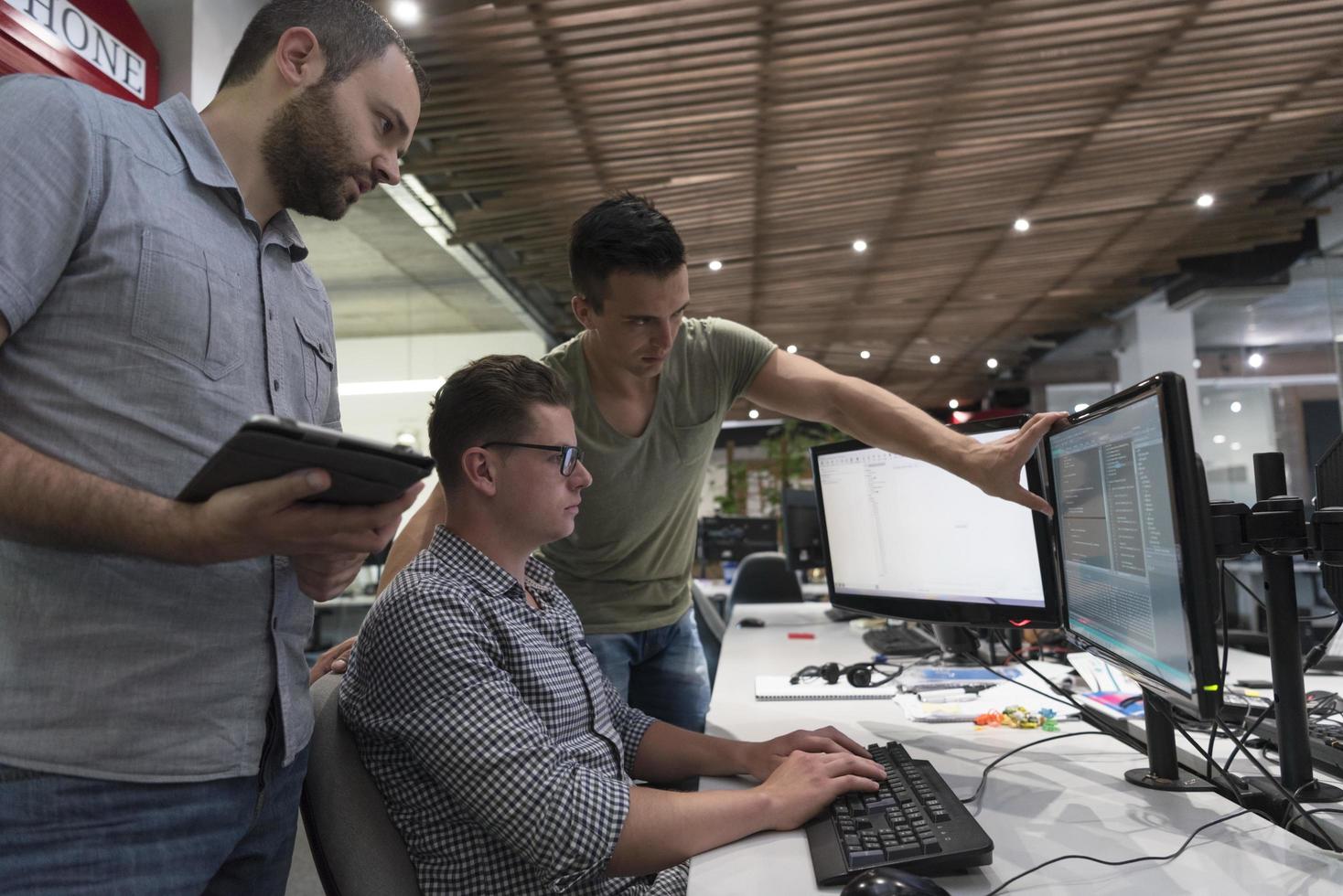 startup business people group working as team to find solution photo